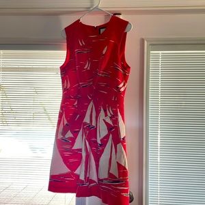 Cute summer dress with sailboats on it. Very nautical.